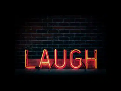 Laugh neon sign